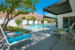 West Facing Backyard with Pool, Spa, Six Lounge Chairs And Retractable Awning